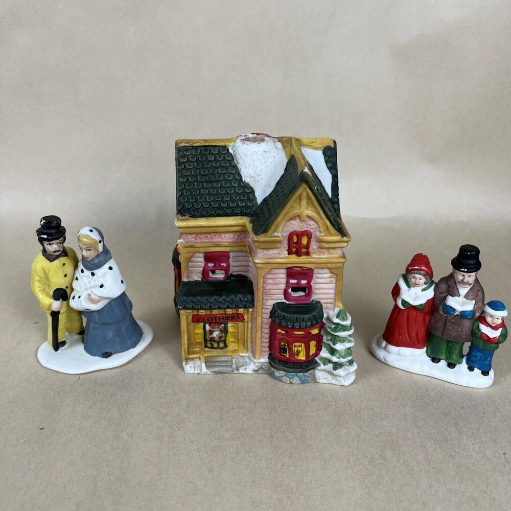 Christmas Victorian Village Collectible “Clothiers Shop” And 2 Figurines